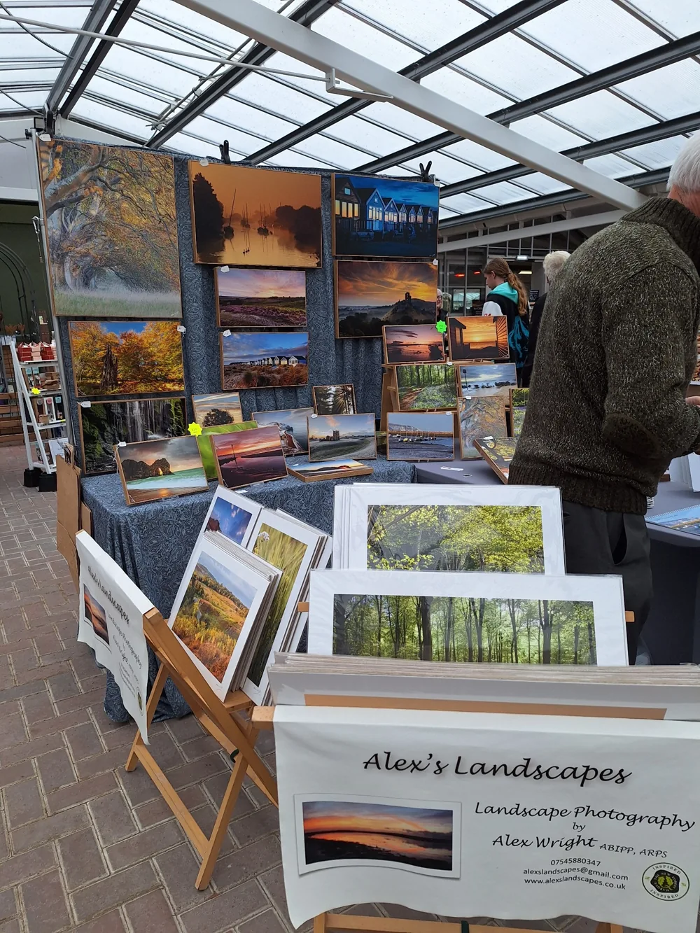 Alex Wright’s landscape photography on display at a previous market