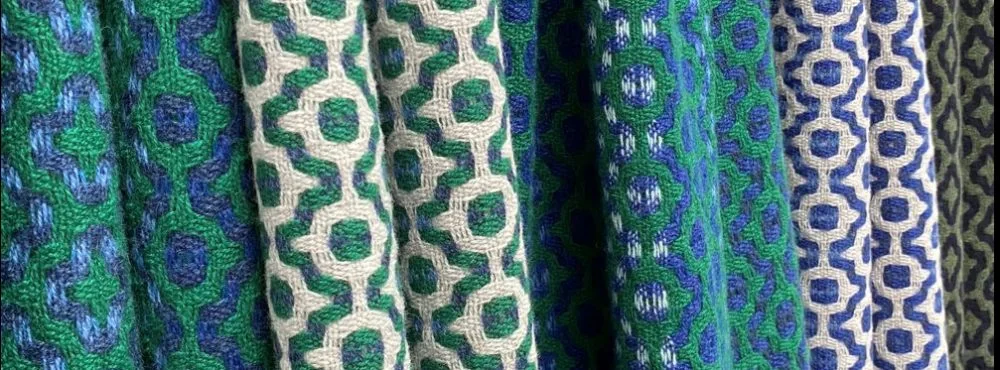 Blue, green and cream handwoven textiles by Emma Baker