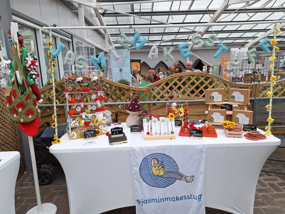 Colourful handmade crochet displayed at Jasmin Makes Stuff’s market stall