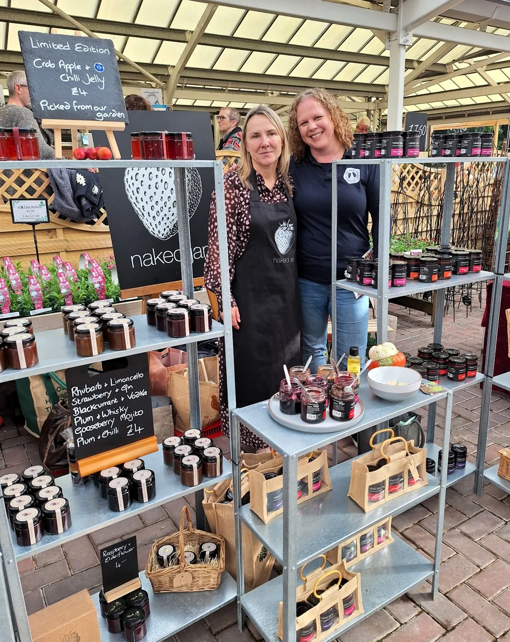 Jen Williams with Naked Jam preserves at a market