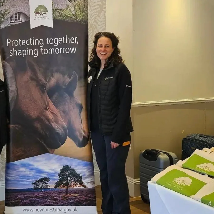 A New Forest Ranger beside a New Forest National Park display