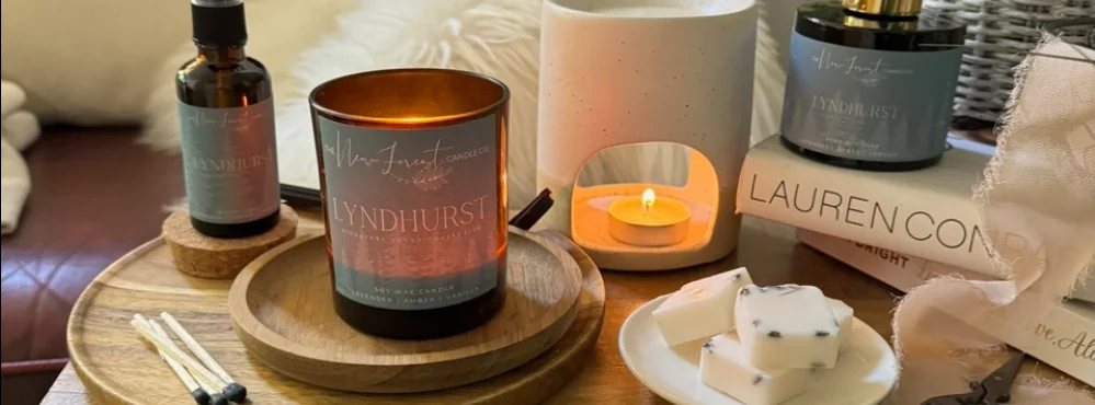 A lit Lyndhurst candle with home fragrance and wax melts